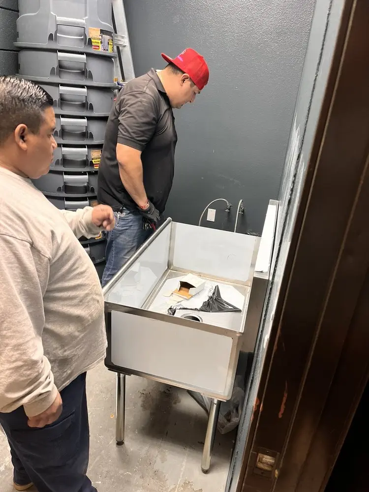 Commercial plumbing and sink installation in Encino